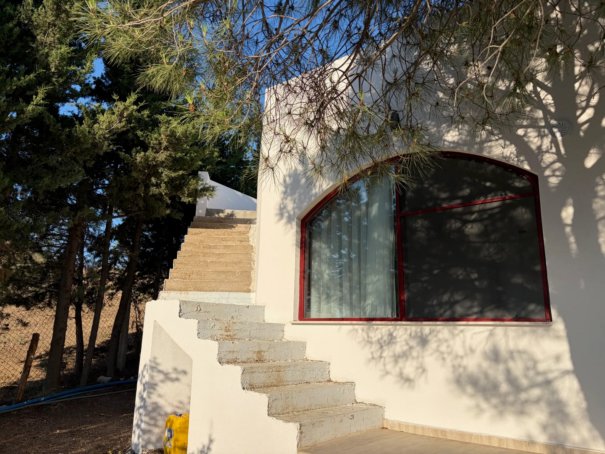White stairs and arches
